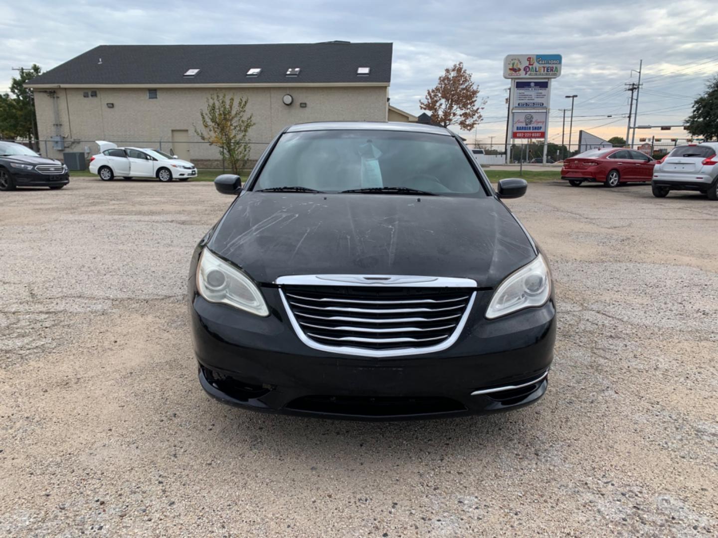 2012 Black /Black Chrysler 200 LX (1C3CCBAB3CN) with an 2.4L L4 DOHC 16V engine, Automatic transmission, located at 1830 North Belt Line Road, Irving, TX, 75061, (469) 524-0199, 32.834373, -96.993584 - Photo#1